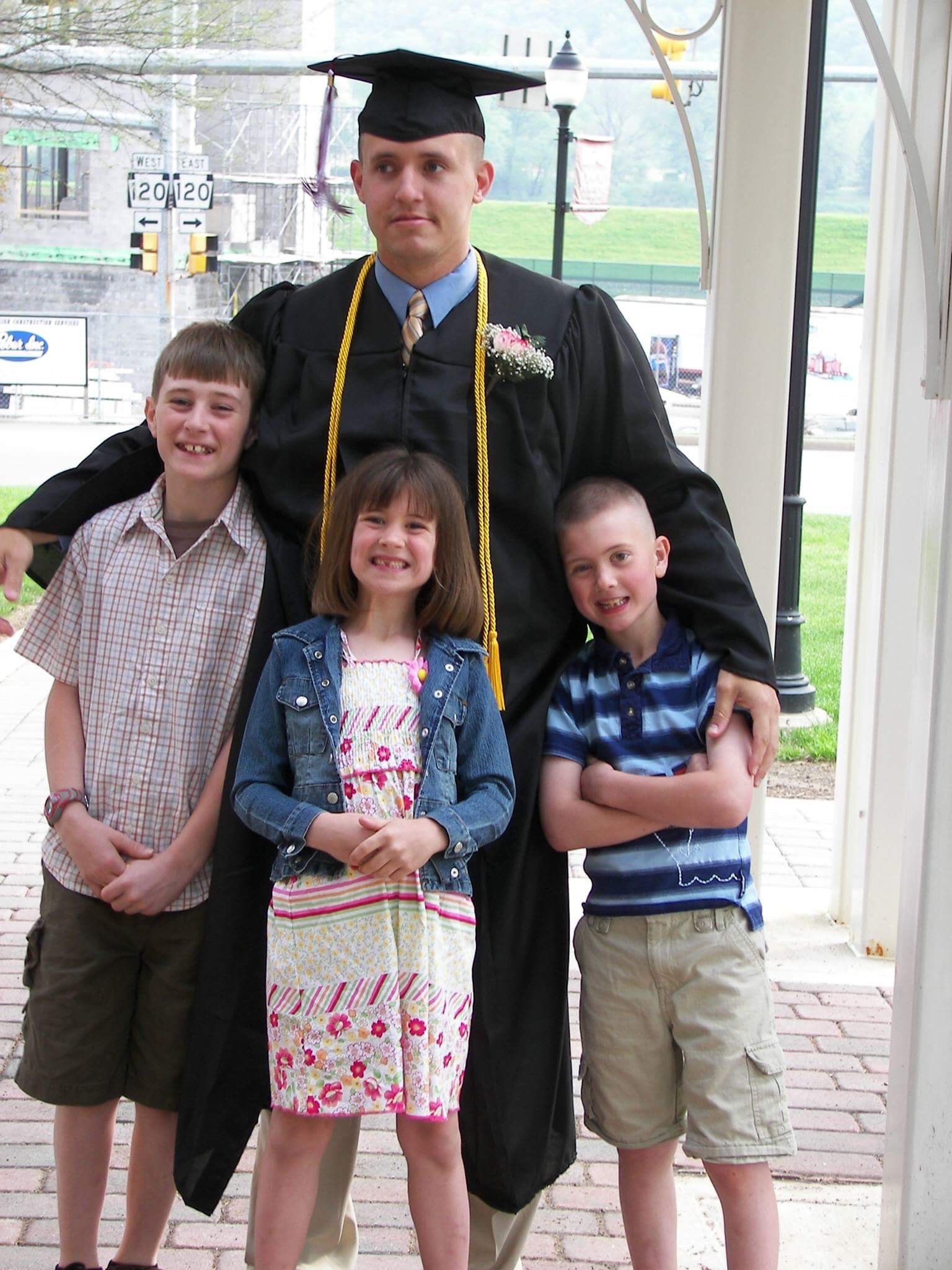 SSG Leek with his children at his graduation